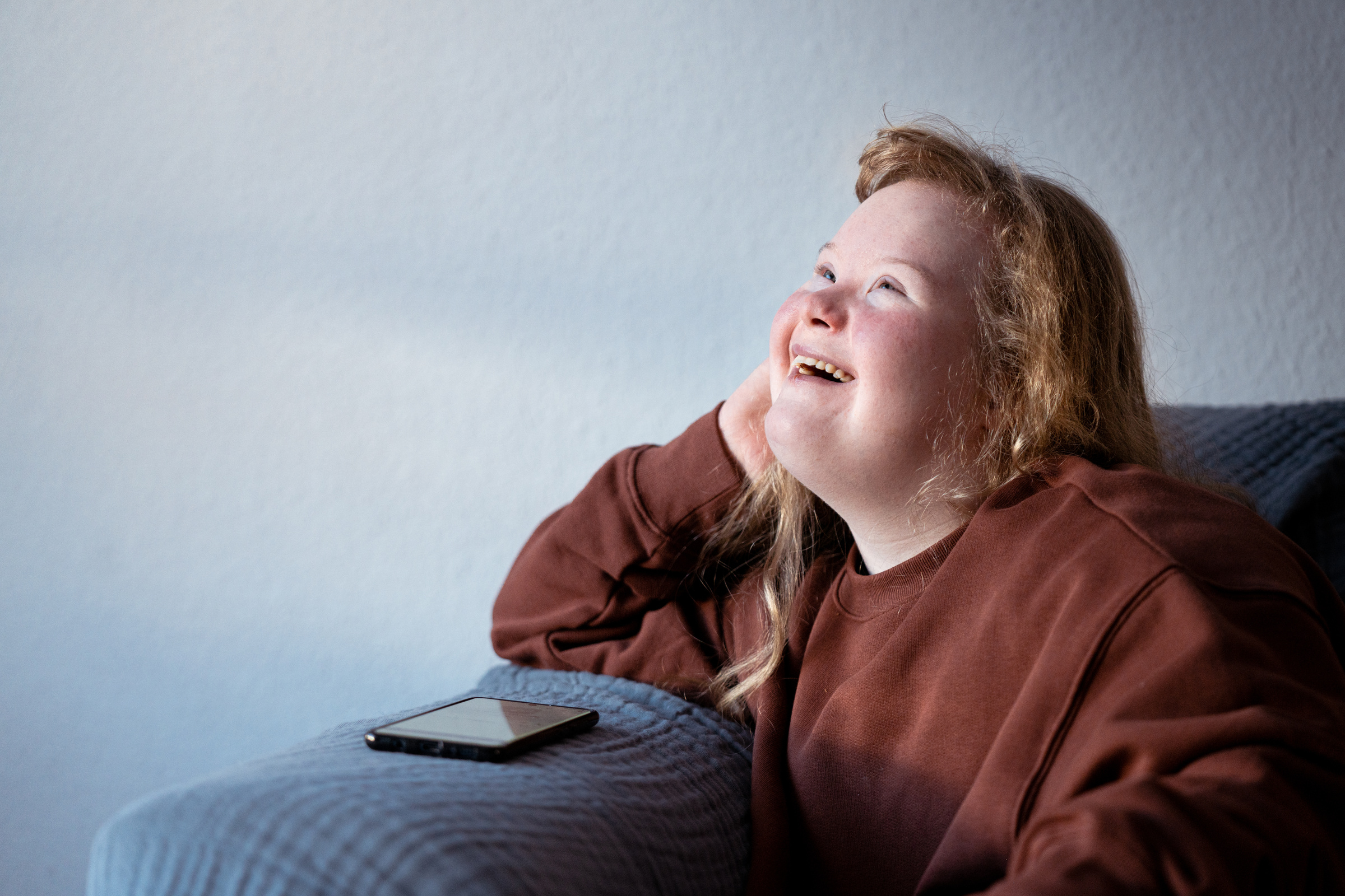 Teen Girl with Down Syndrome with Smartphone